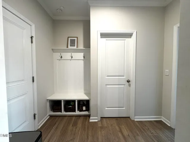 a bathroom with a sink toilet and mirror