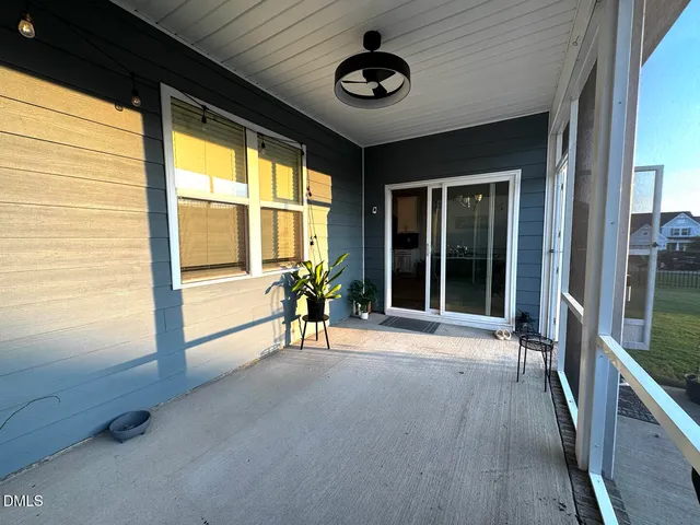 a view of a terrace with a back yard