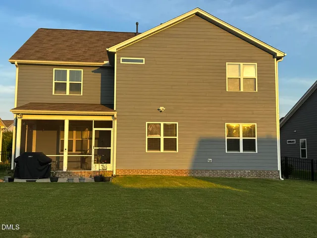 a view of a swimming pool with a lounge chair