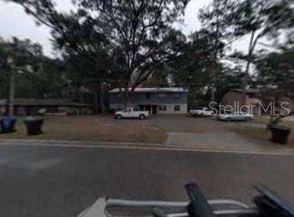 3611 Southwest 28th Terrace, Unit B Gainesville, FL 32608 - Photo 1 of 1 a view of street with parked cars