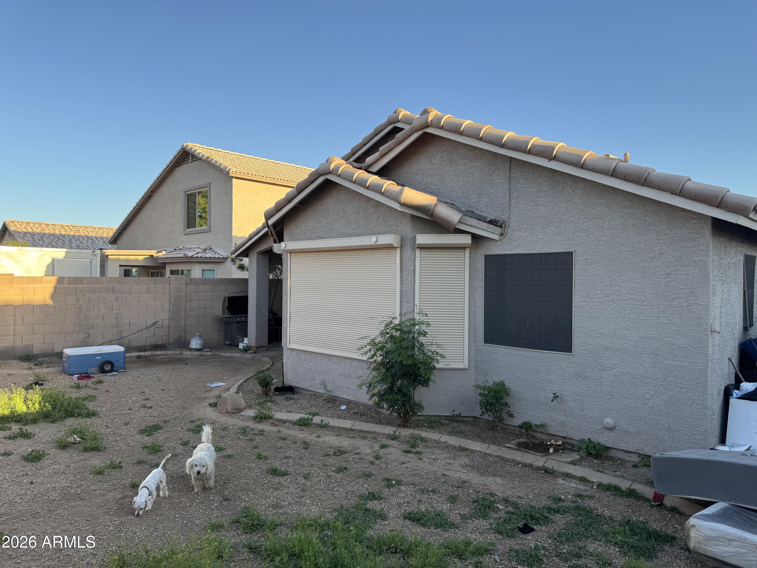 5438 West Sands Road Glendale, AZ 85301 - Photo 6 of 7 a front view of a house with garden