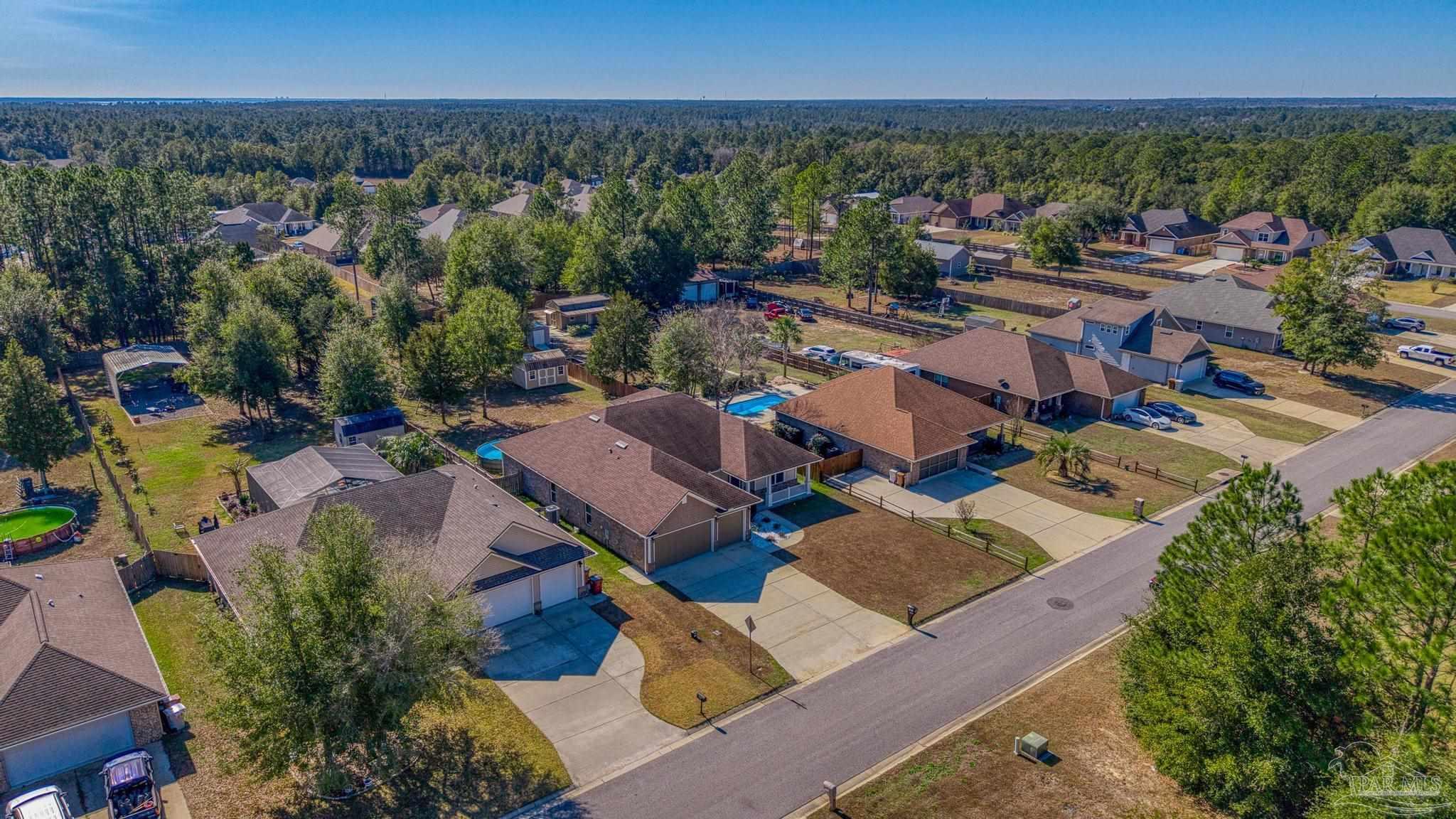 7933 Silver Maple Drive Milton, FL 32583 - Photo 68 of 70 an aerial view of a city