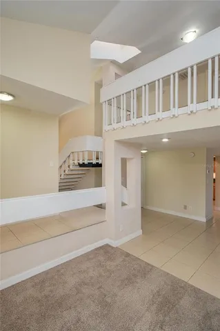 a view of an entryway with a kitchen