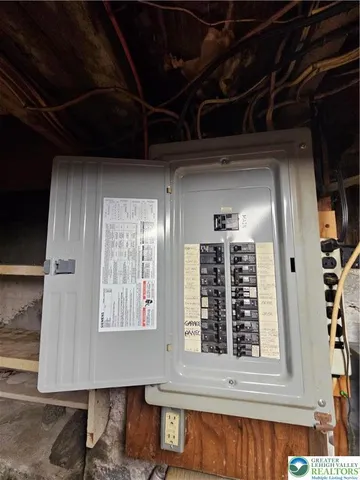 a view of an empty room with wooden roof