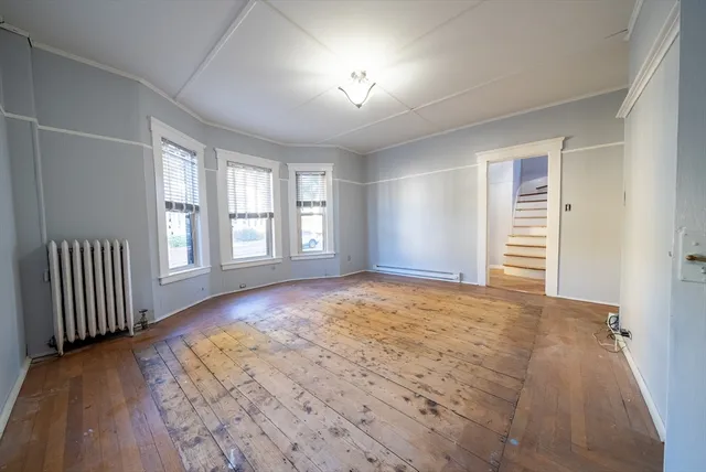 an empty room with windows