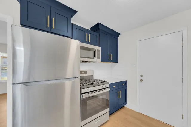 a view of a backyard with green space