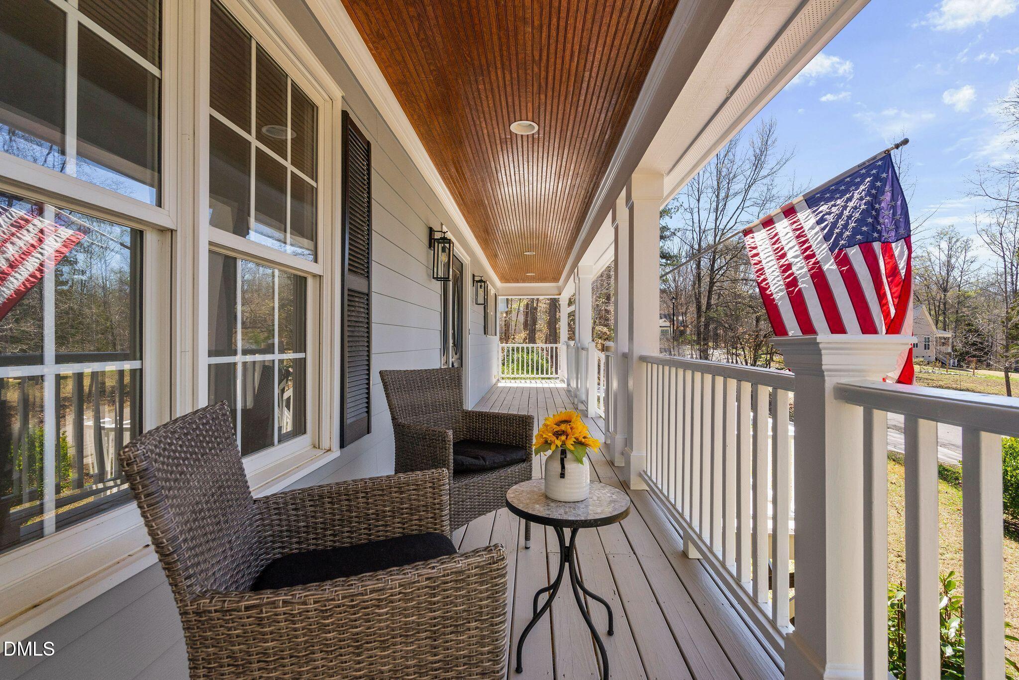 180 Normandy Road Louisburg, NC 27549 - Photo 2 of 73 Porch w/ Partial Pond View
