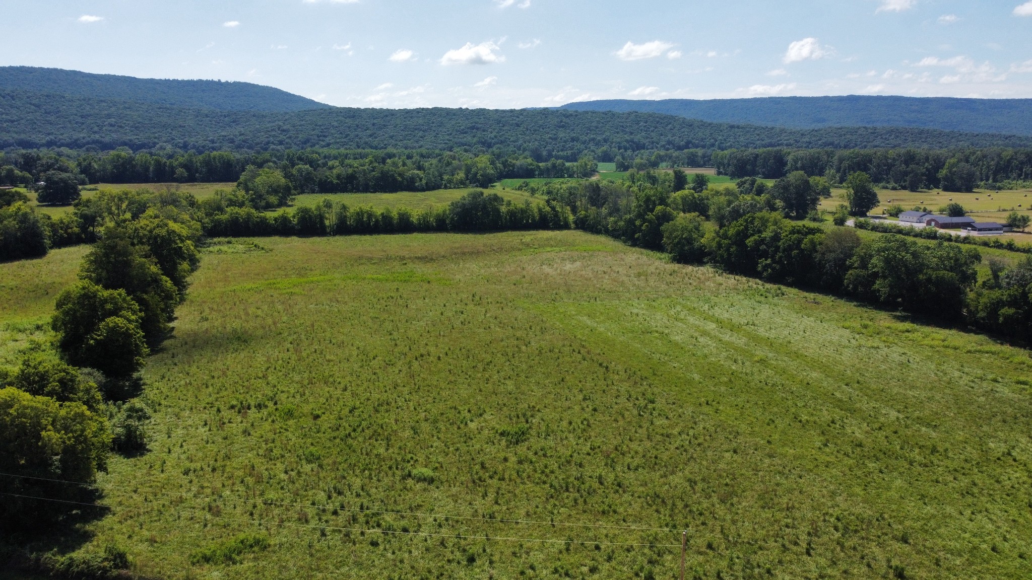 5600 Sr 50 Pelham, TN 37366 - Photo 1 of 13 a view of a large mountain with grassy field