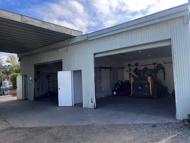 a large room with gym equipment and a large window
