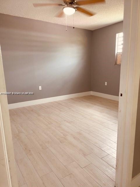 11241 Southwest 7th Terrace, Unit 1 Sweetwater, FL 33174 - Photo 4 of 34 a view of an empty room