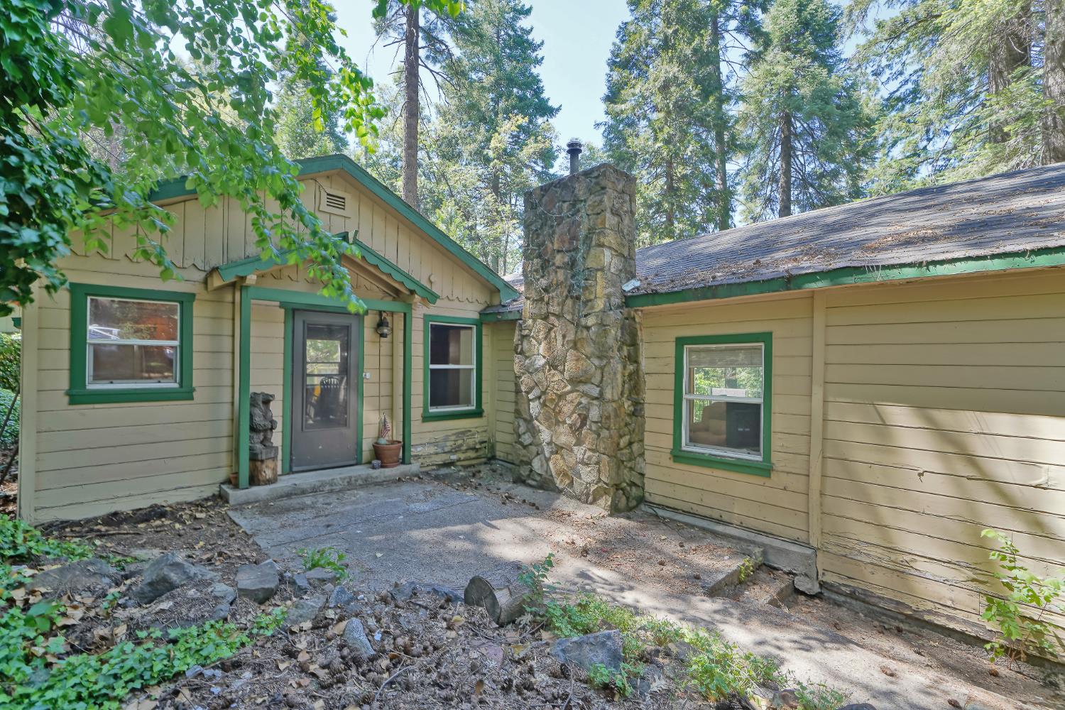 6929 Split Bend Road Pollock Pines, CA 95726 - Photo 2 of 38 a view of a house with a yard