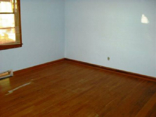 1608 Rural Street Rockford, IL 61107 - Photo 3 of 6 an empty room with a window