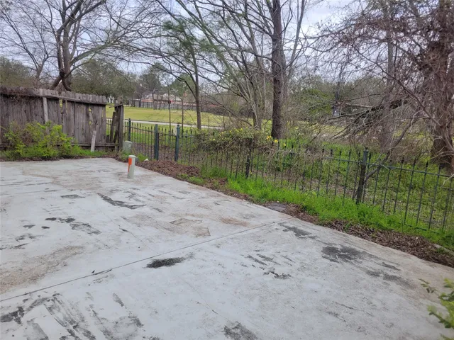 a view of a lake with a house in the background