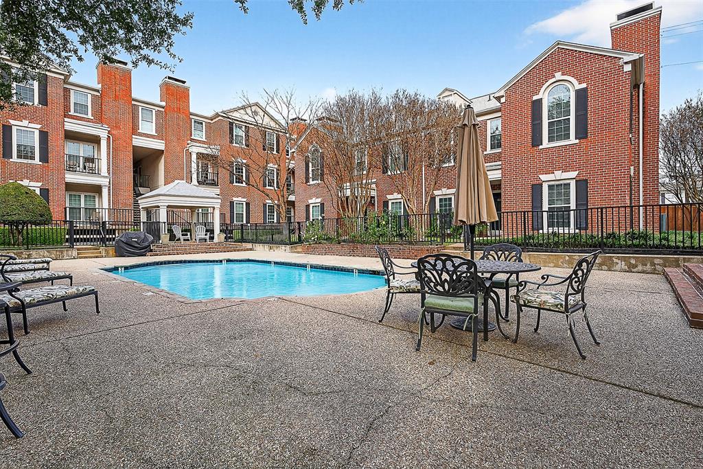 5407 Bryan Street, Unit B104 Dallas, TX 75206 - Photo 23 of 38 a view of a swimming pool with outdoor seating