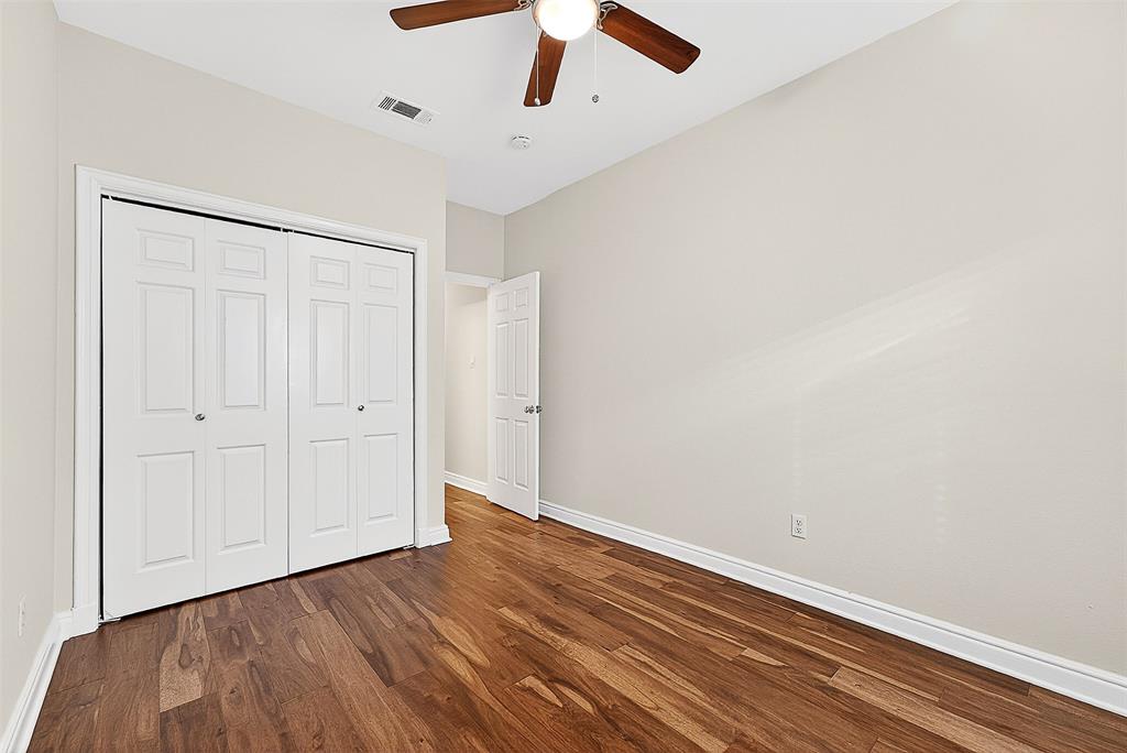 5407 Bryan Street, Unit B104 Dallas, TX 75206 - Photo 38 of 38 wooden floor in an empty room
