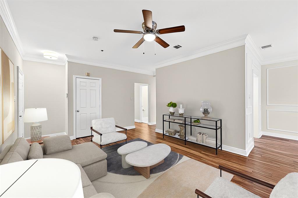 5407 Bryan Street, Unit B104 Dallas, TX 75206 - Photo 6 of 38 a living room with furniture and a wooden floor