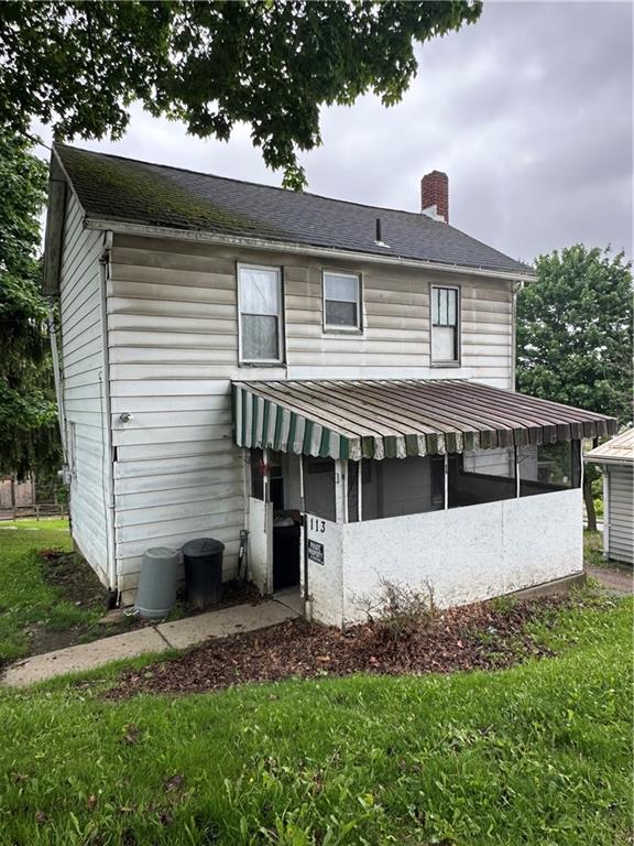 113 Morton Avenue Butler, PA 16001 - Photo 1 of 15 a front view of a house with a garden and yard