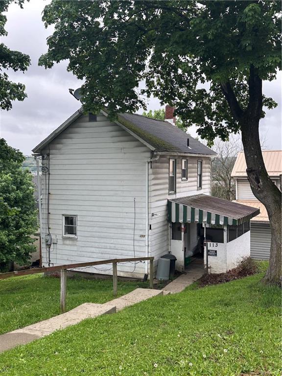 113 Morton Avenue Butler, PA 16001 - Photo 2 of 15 front view of a house with a yard