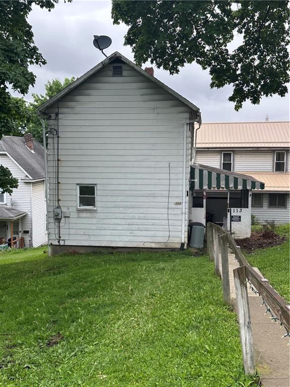 113 Morton Avenue Butler, PA 16001 - Photo 3 of 15 a view of a backyard with a garden