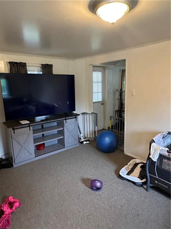 113 Morton Avenue Butler, PA 16001 - Photo 5 of 15 a room with furniture and a flat screen tv
