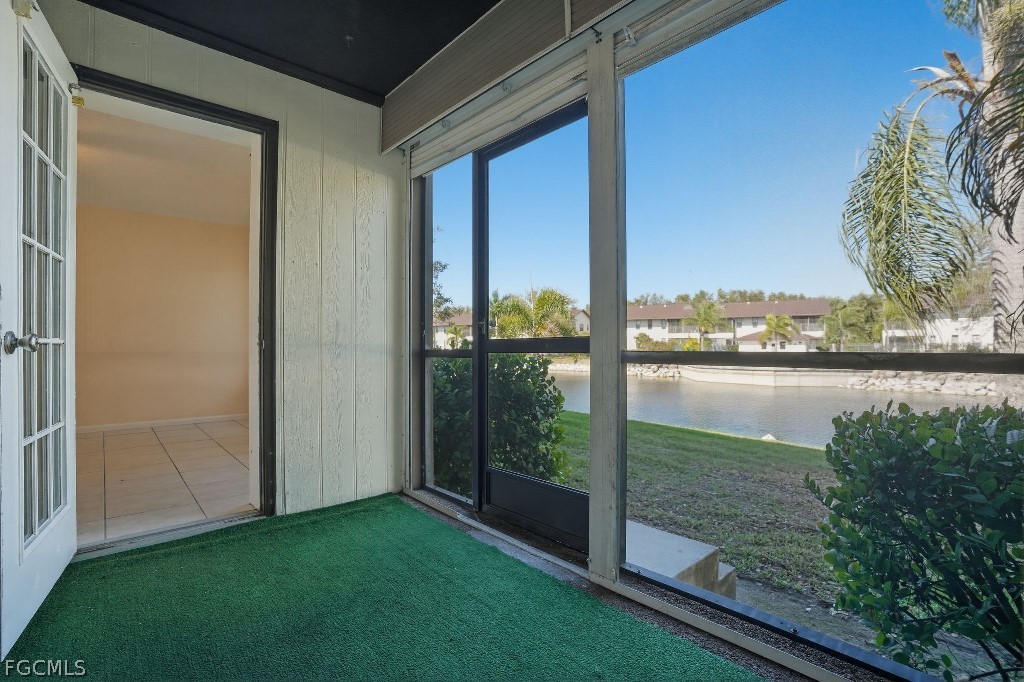 5369 Treetops Drive, Unit M102 Naples, FL 34113 - Photo 2 of 11 a view of a balcony with lake