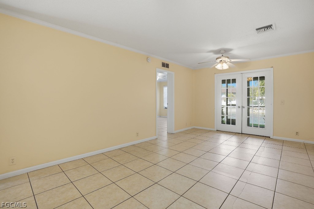5369 Treetops Drive, Unit M102 Naples, FL 34113 - Photo 5 of 11 a view of an empty room and window