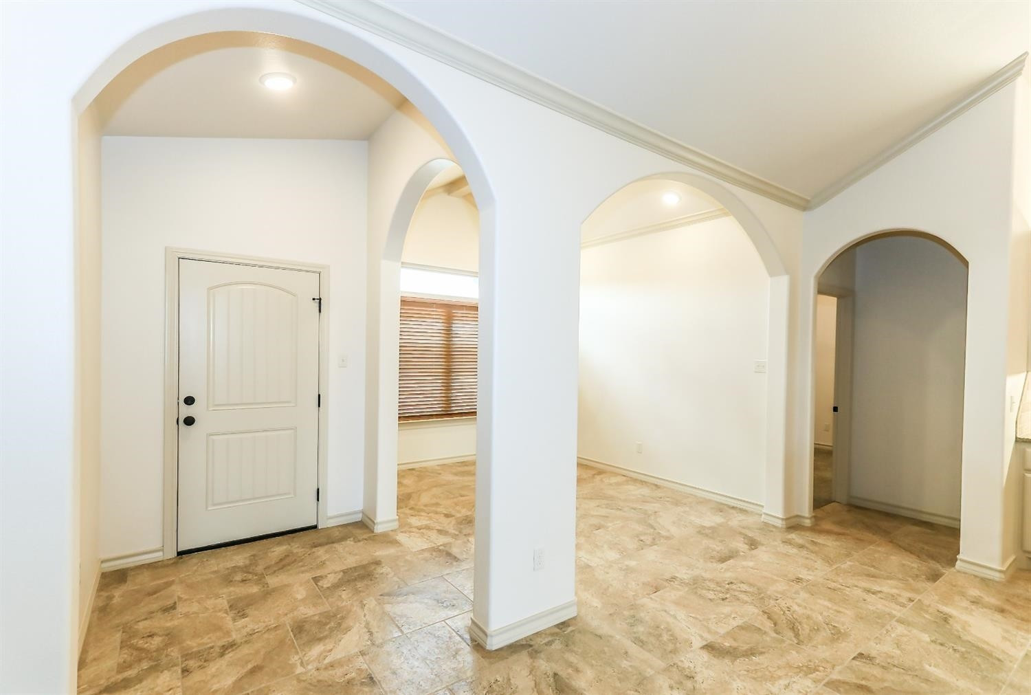 5234 Kemper Street Lubbock, TX 79416 - Photo 4 of 10 a view of entryway with wooden floor