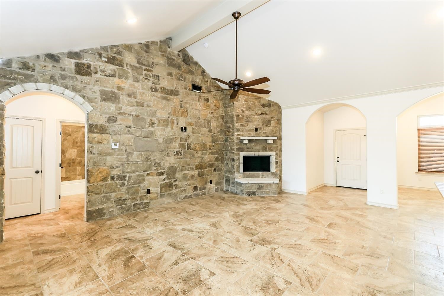 5234 Kemper Street Lubbock, TX 79416 - Photo 6 of 10 a view of empty room with windows