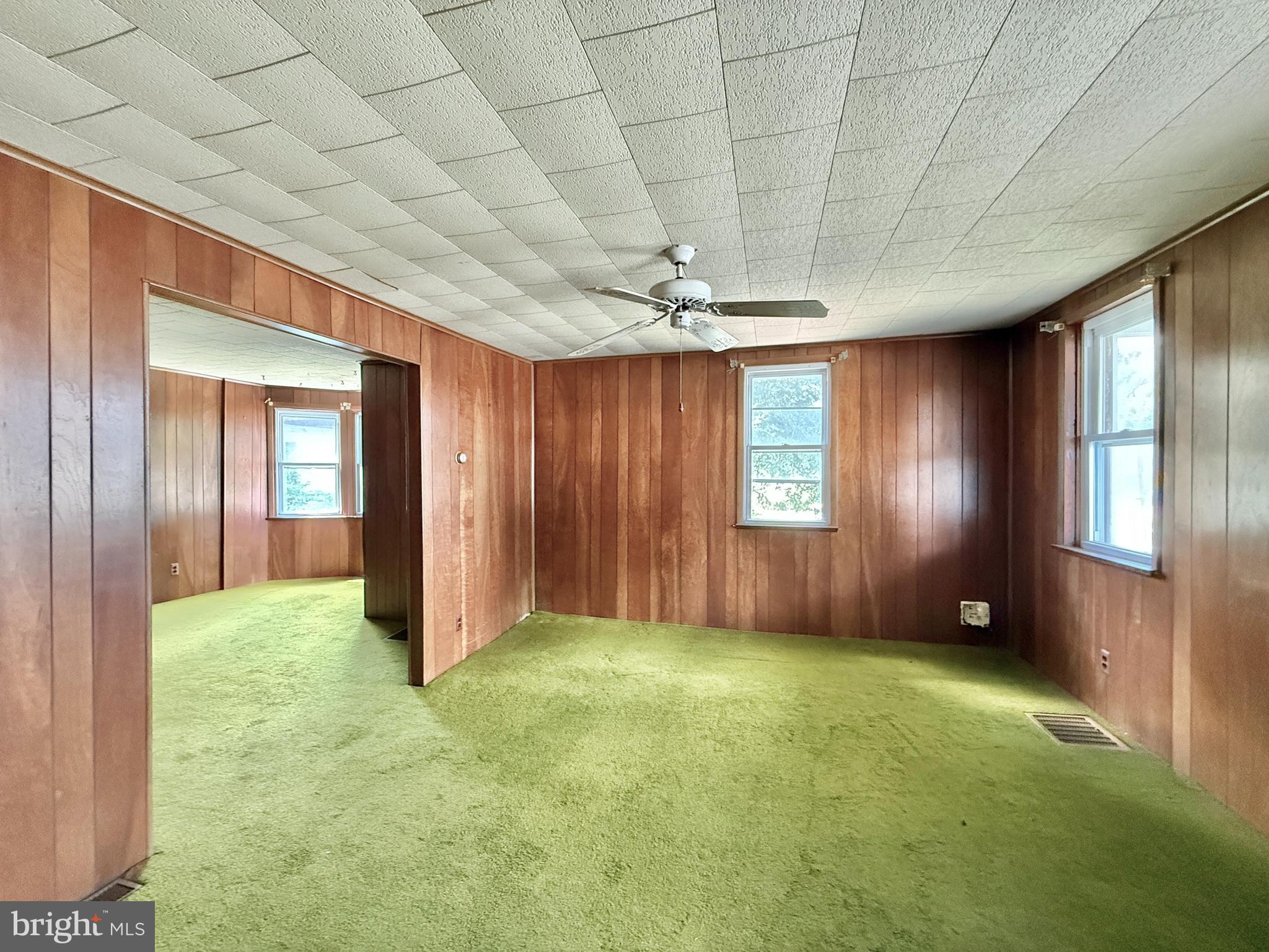 2472 Monmouth Road Jobstown, NJ 08041 - Photo 13 of 27 a view of an empty room with closet and wooden floor
