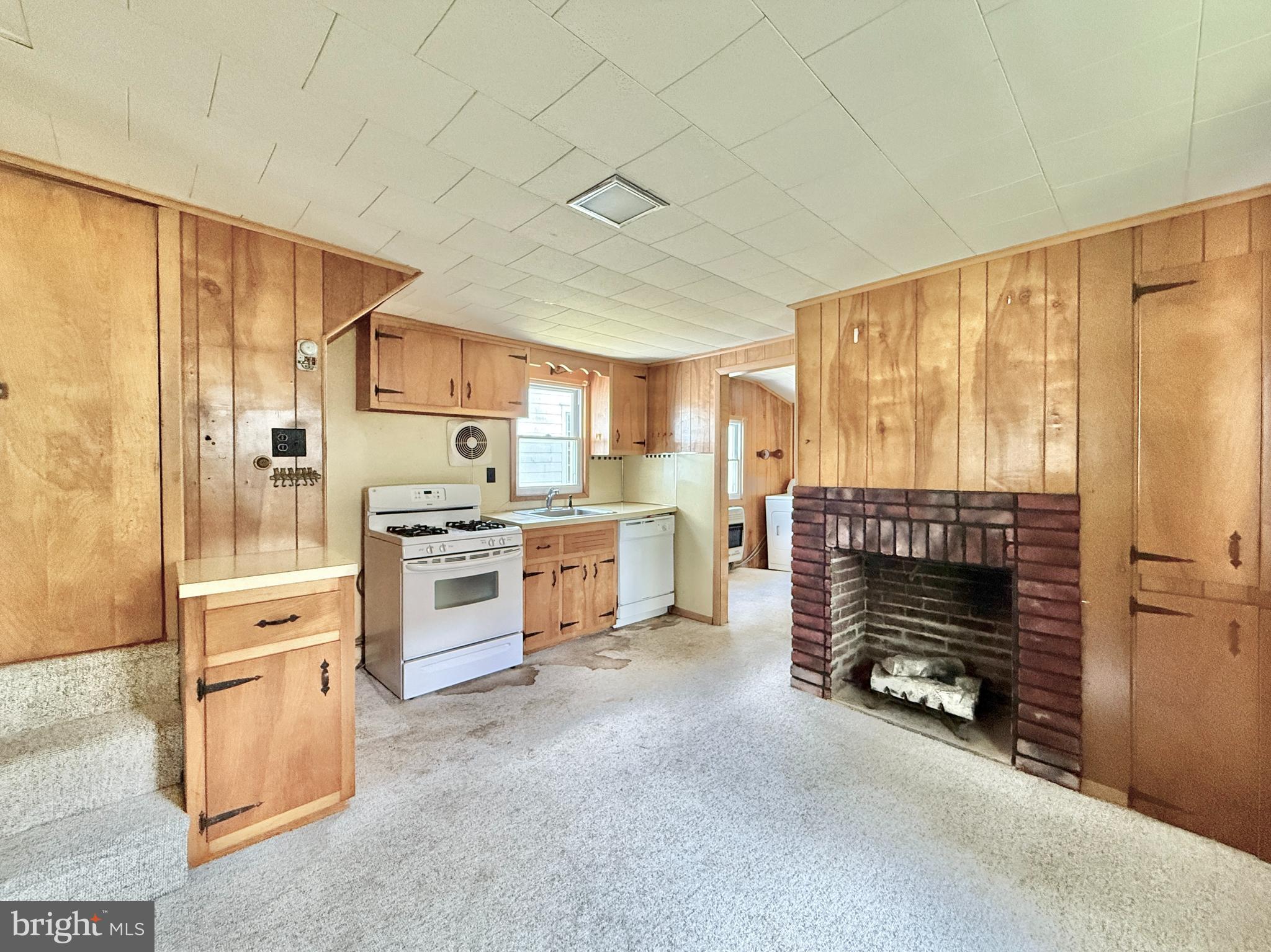 2472 Monmouth Road Jobstown, NJ 08041 - Photo 14 of 27 a kitchen with a refrigerator and a stove