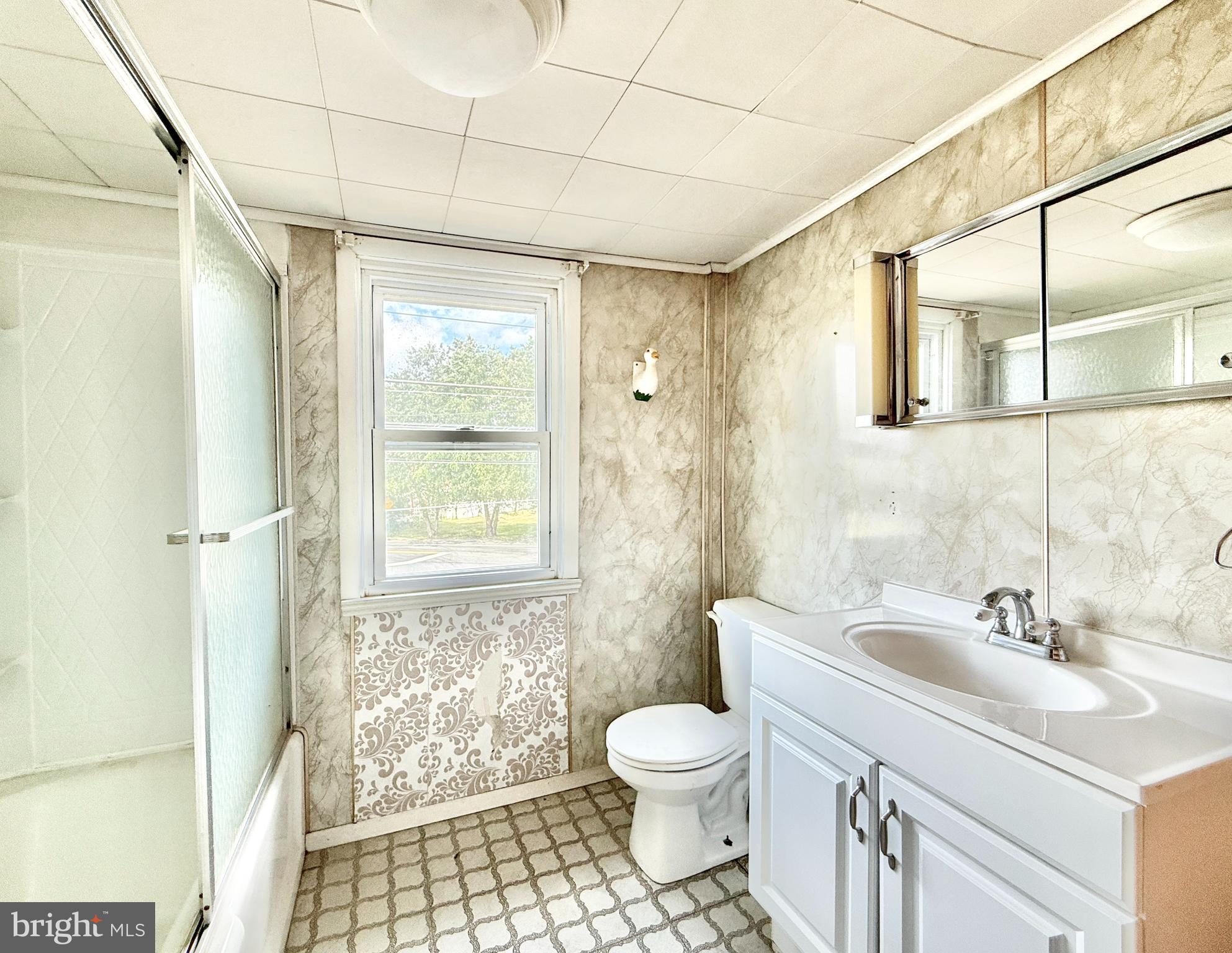 2472 Monmouth Road Jobstown, NJ 08041 - Photo 24 of 27 a bathroom with a sink toilet and shower