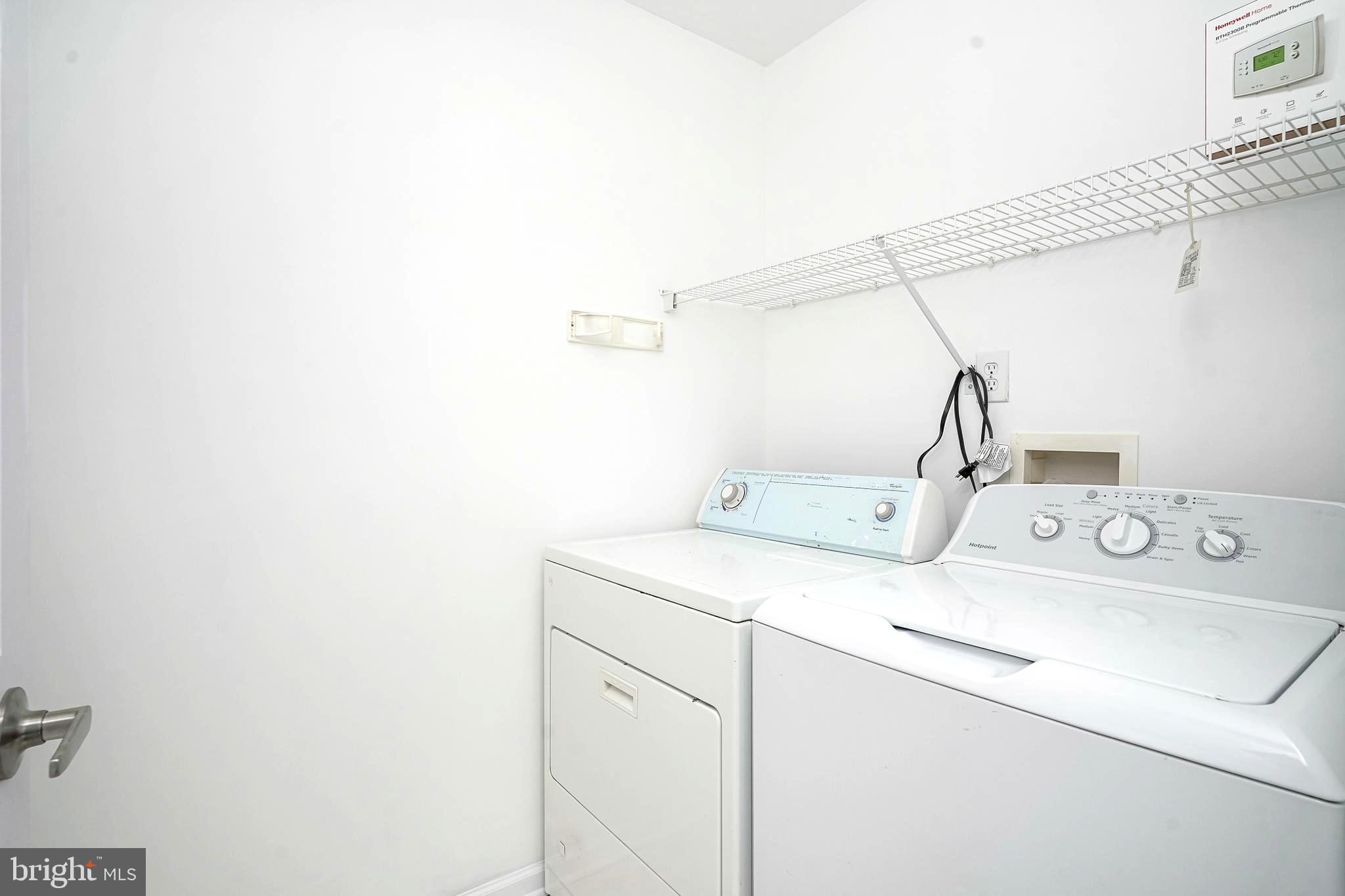 176 Trellis Lane Sewell, NJ 08080 - Photo 13 of 27 a utility room with dryer and washer
