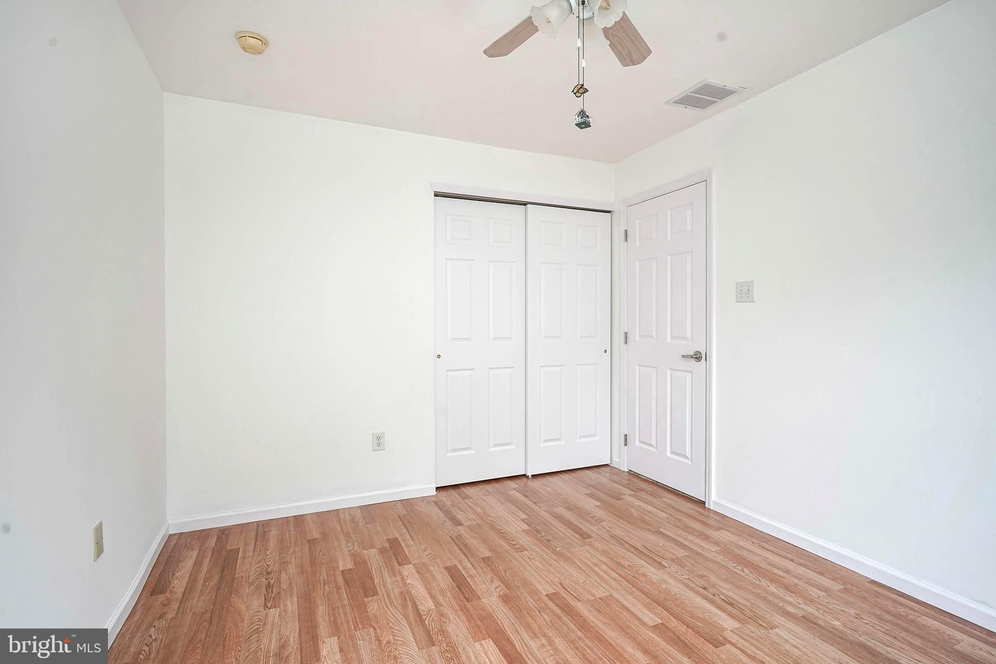 176 Trellis Lane Sewell, NJ 08080 - Photo 15 of 27 a view of an empty room with wooden floor