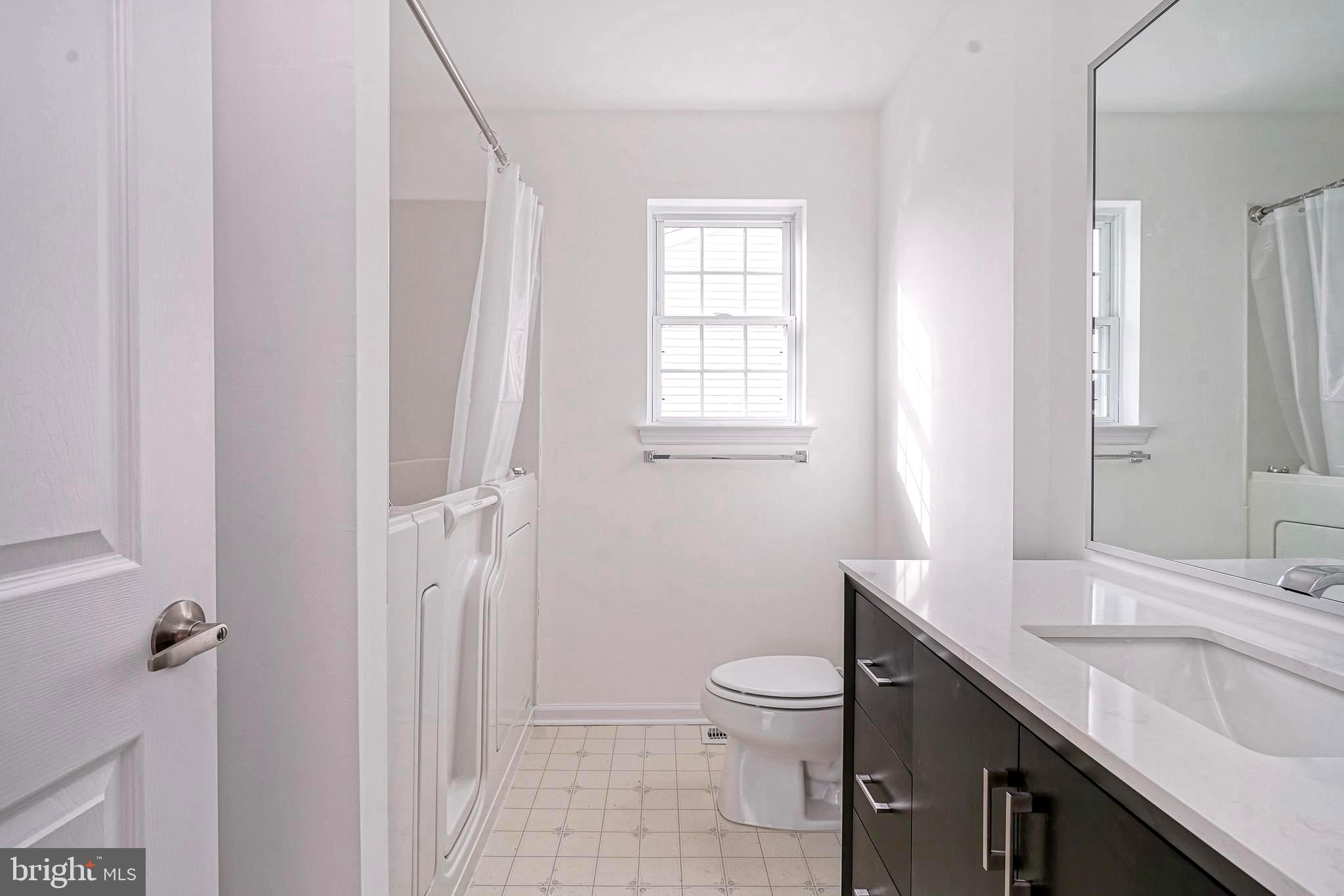 176 Trellis Lane Sewell, NJ 08080 - Photo 23 of 27 a bathroom with a double vanity sink toilet and shower
