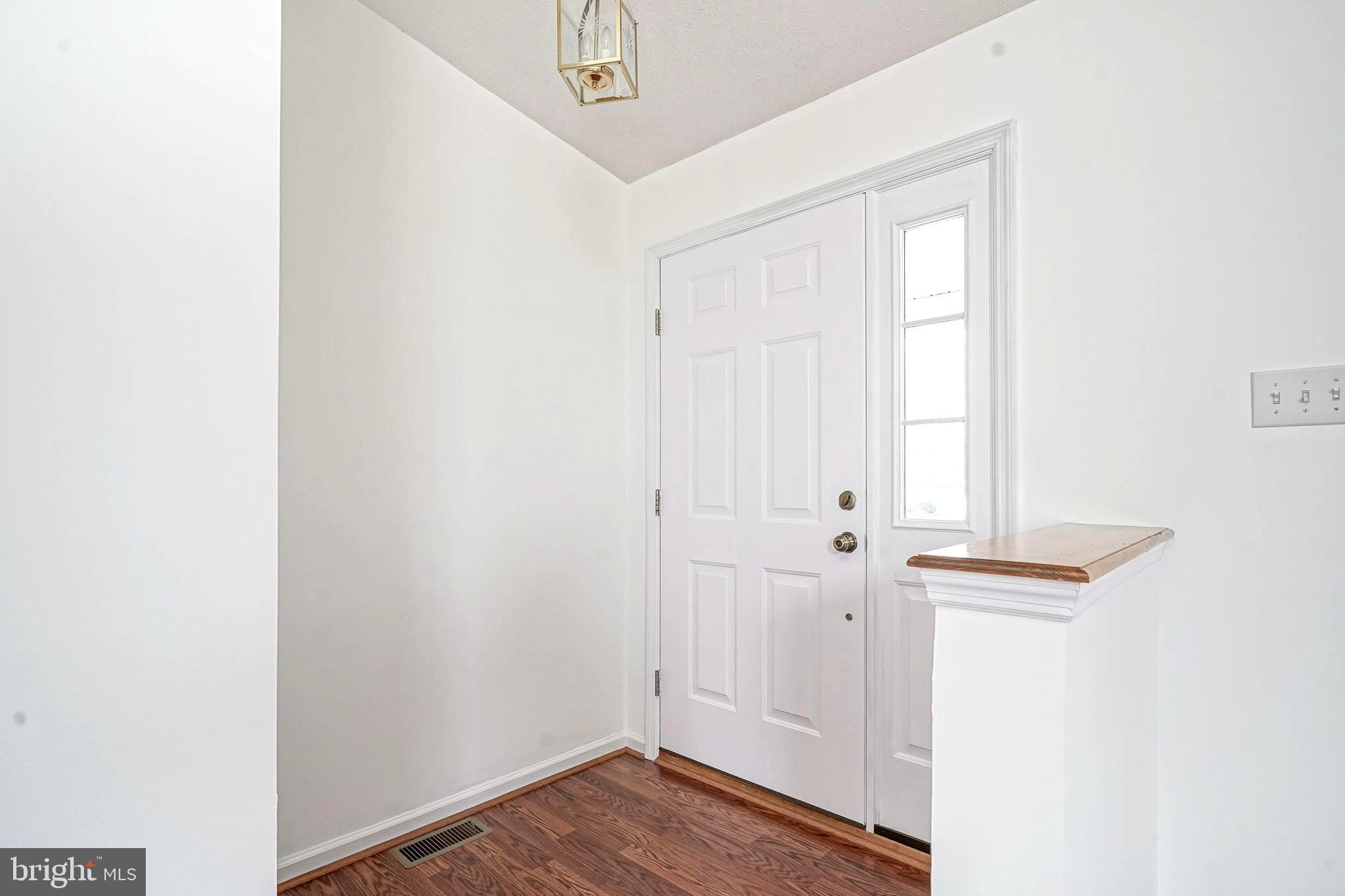 176 Trellis Lane Sewell, NJ 08080 - Photo 8 of 27 an empty room with wooden floor