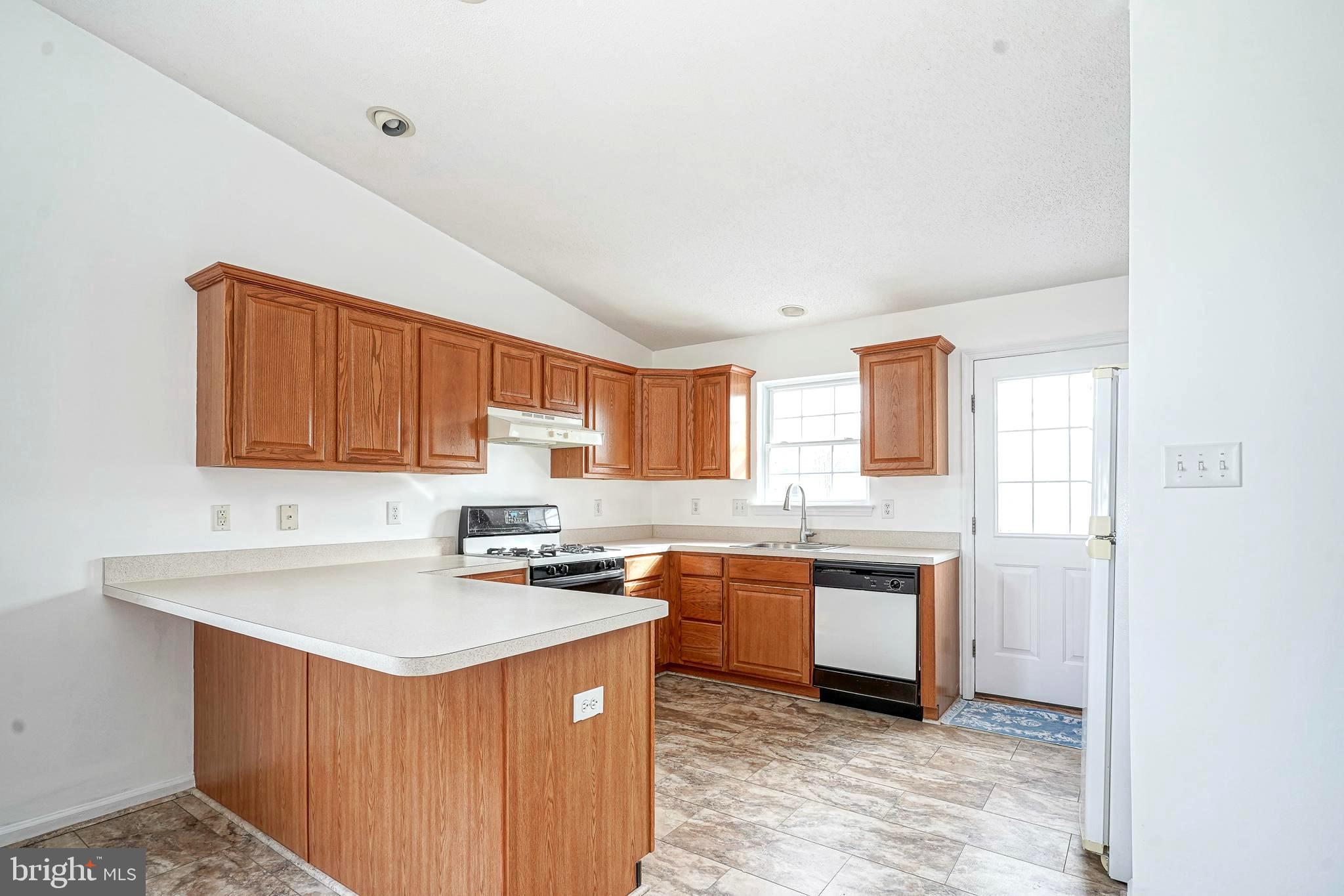 176 Trellis Lane Sewell, NJ 08080 - Photo 9 of 27 a kitchen with a sink and cabinets