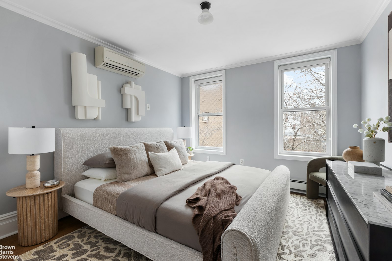 50 Eldert Street Brooklyn, NY 11207 - Photo 7 of 11 a bedroom with a bed and a couch