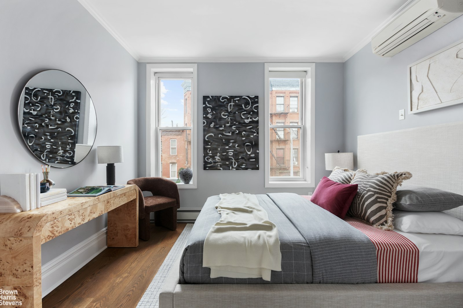 50 Eldert Street Brooklyn, NY 11207 - Photo 9 of 11 a bedroom with a bed a couch and dresser