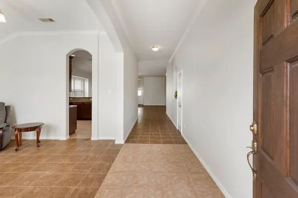 a view of a hallway with a entryway