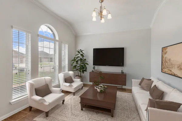 a living room with furniture or couch and a flat screen tv