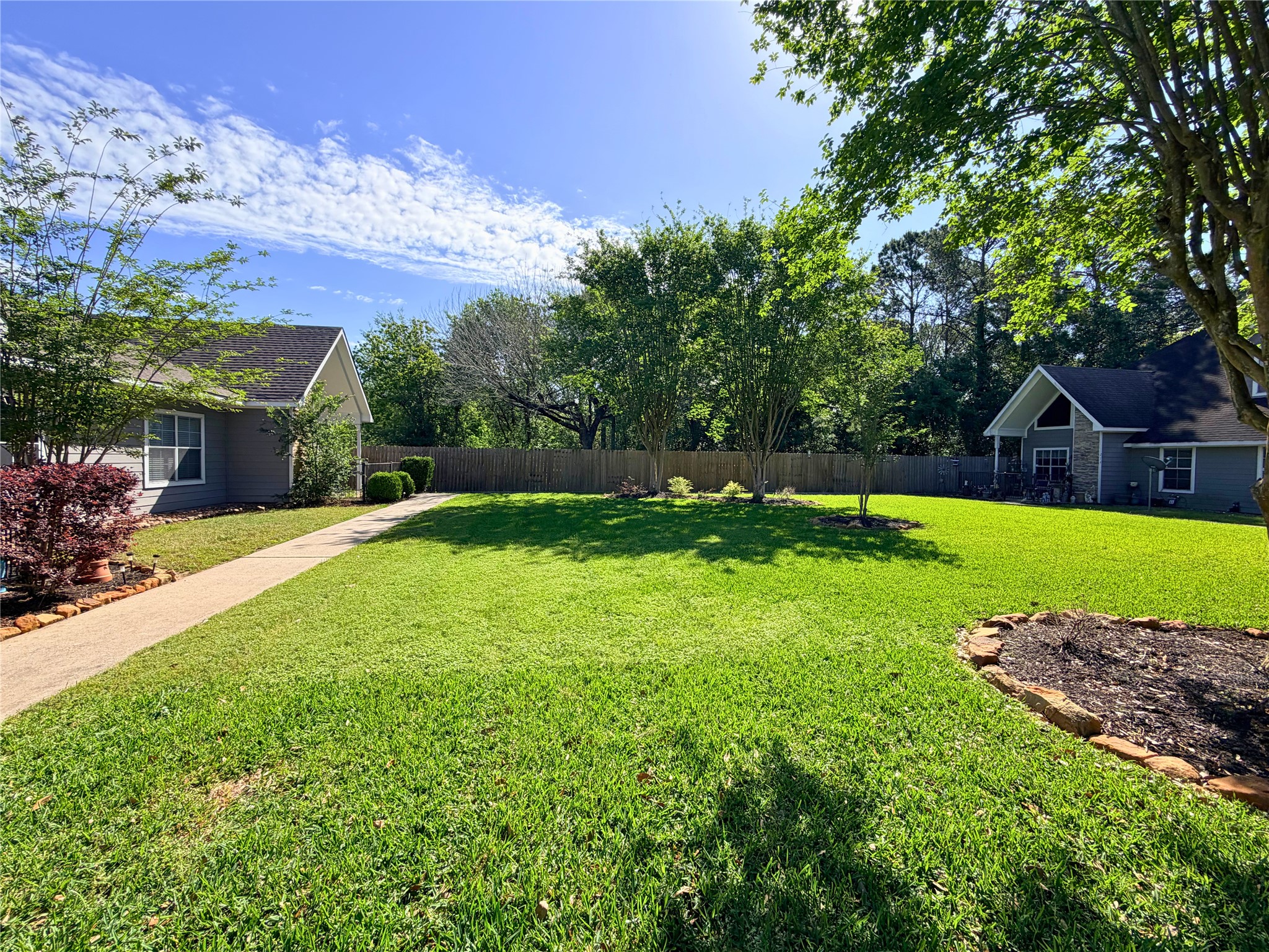 312 Hunt Road, Unit 312 Baytown, TX 77521 - Photo 3 of 28 a view of a house with a big yard