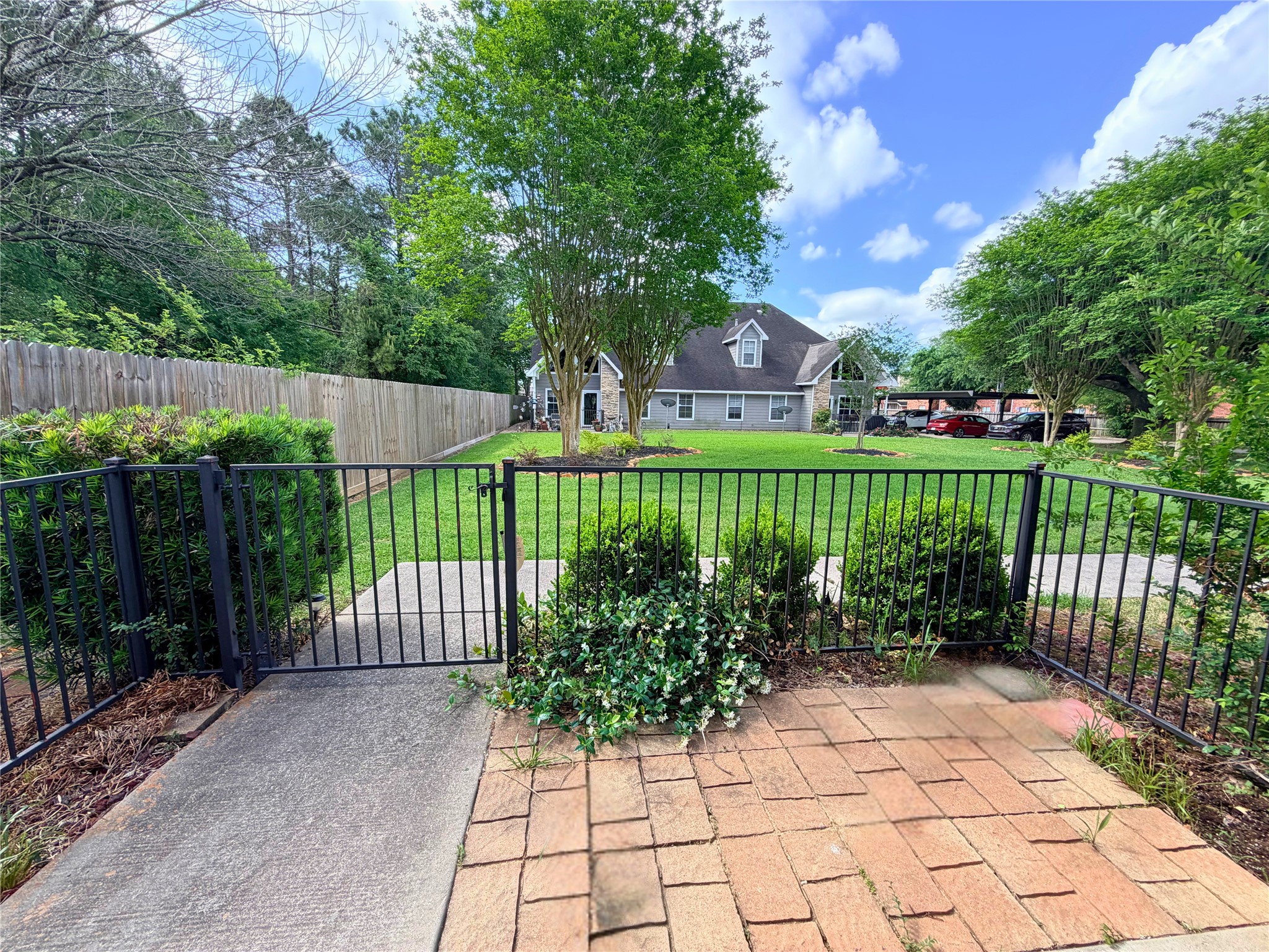 312 Hunt Road, Unit 312 Baytown, TX 77521 - Photo 5 of 28 a view of a backyard with a garden