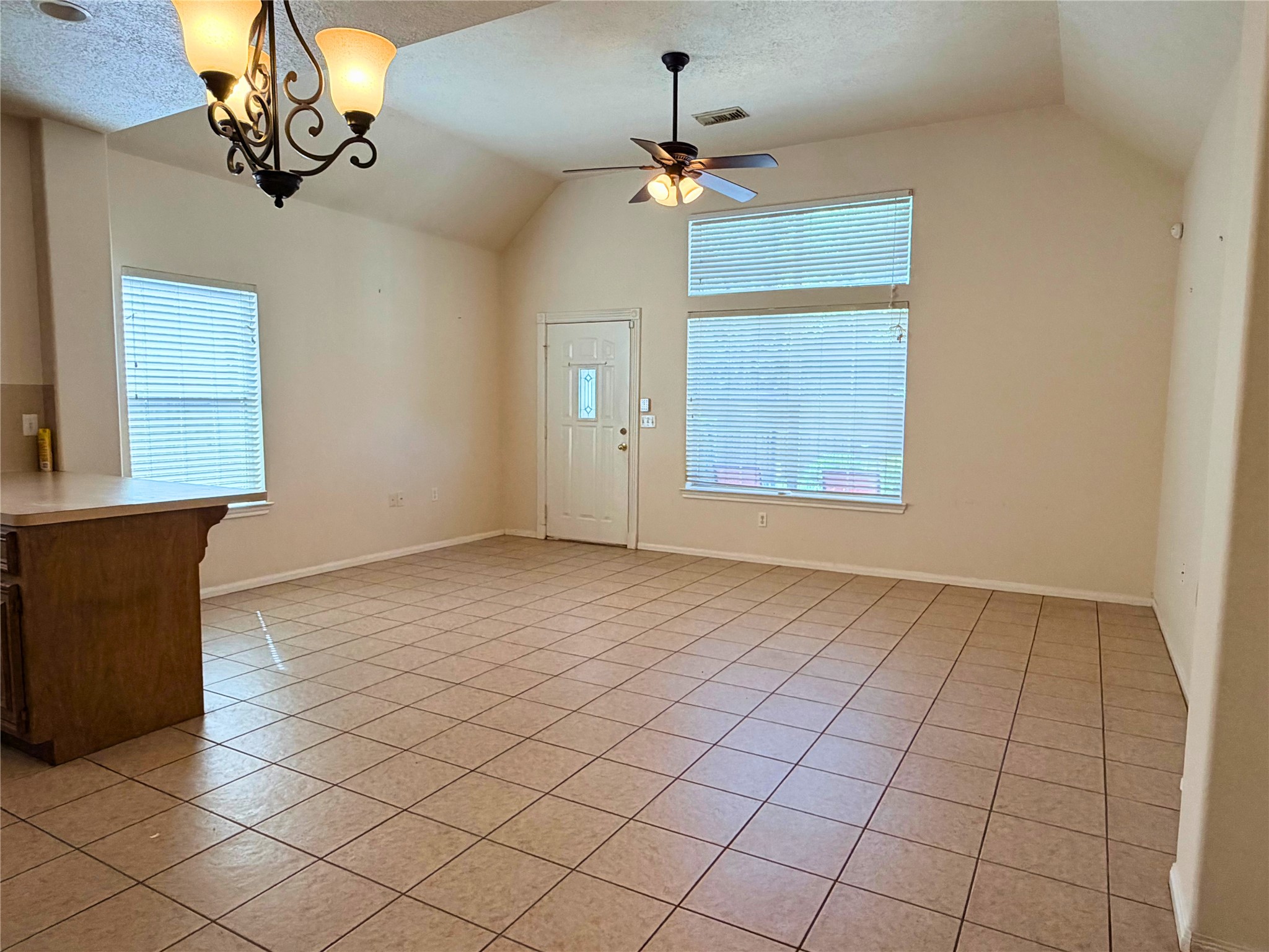 312 Hunt Road, Unit 312 Baytown, TX 77521 - Photo 8 of 28 a view of an empty room with a window
