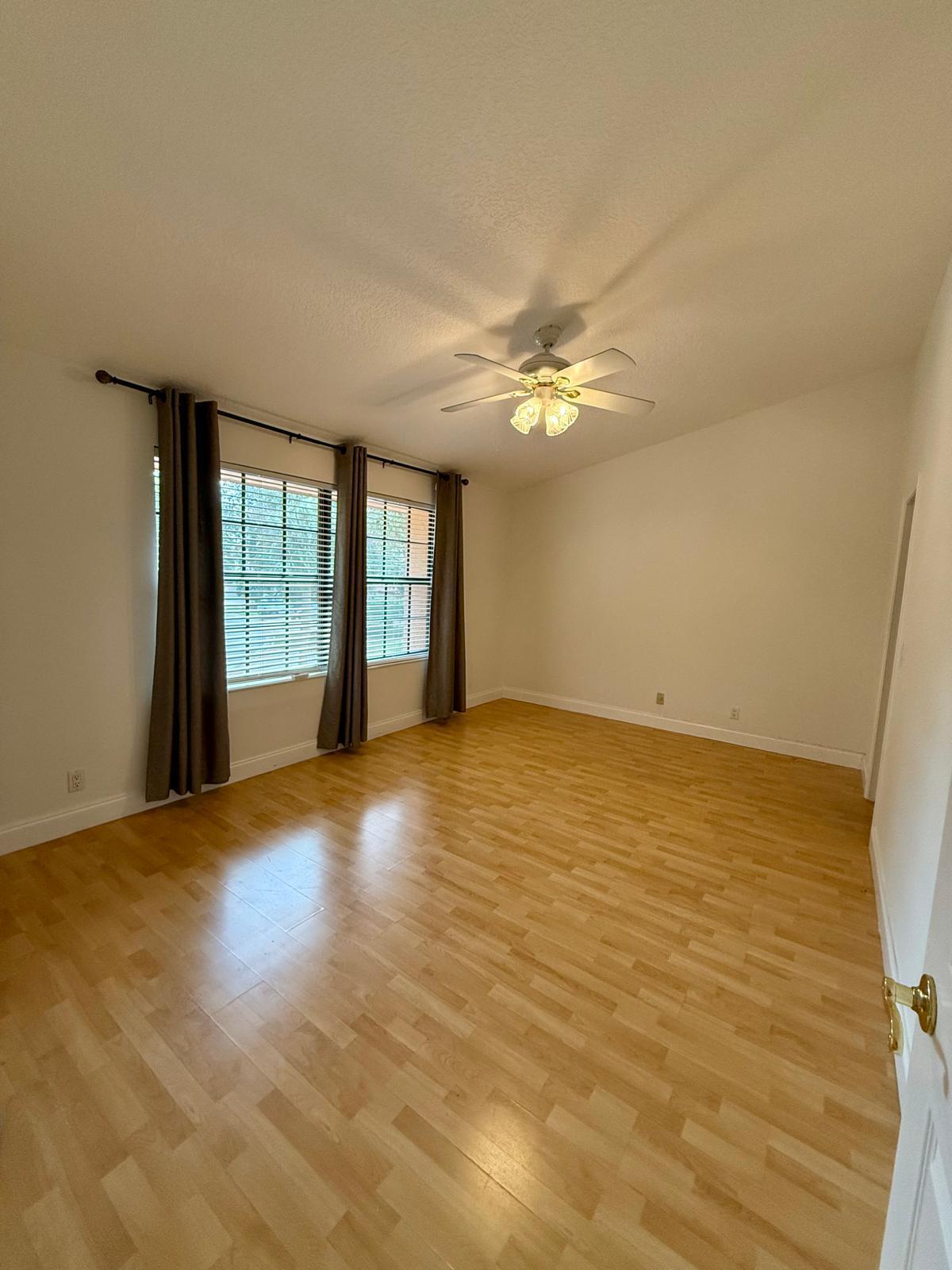 7888 La Mirada Drive Boca Raton, FL 33433 - Photo 12 of 29 a view of an empty room with a window