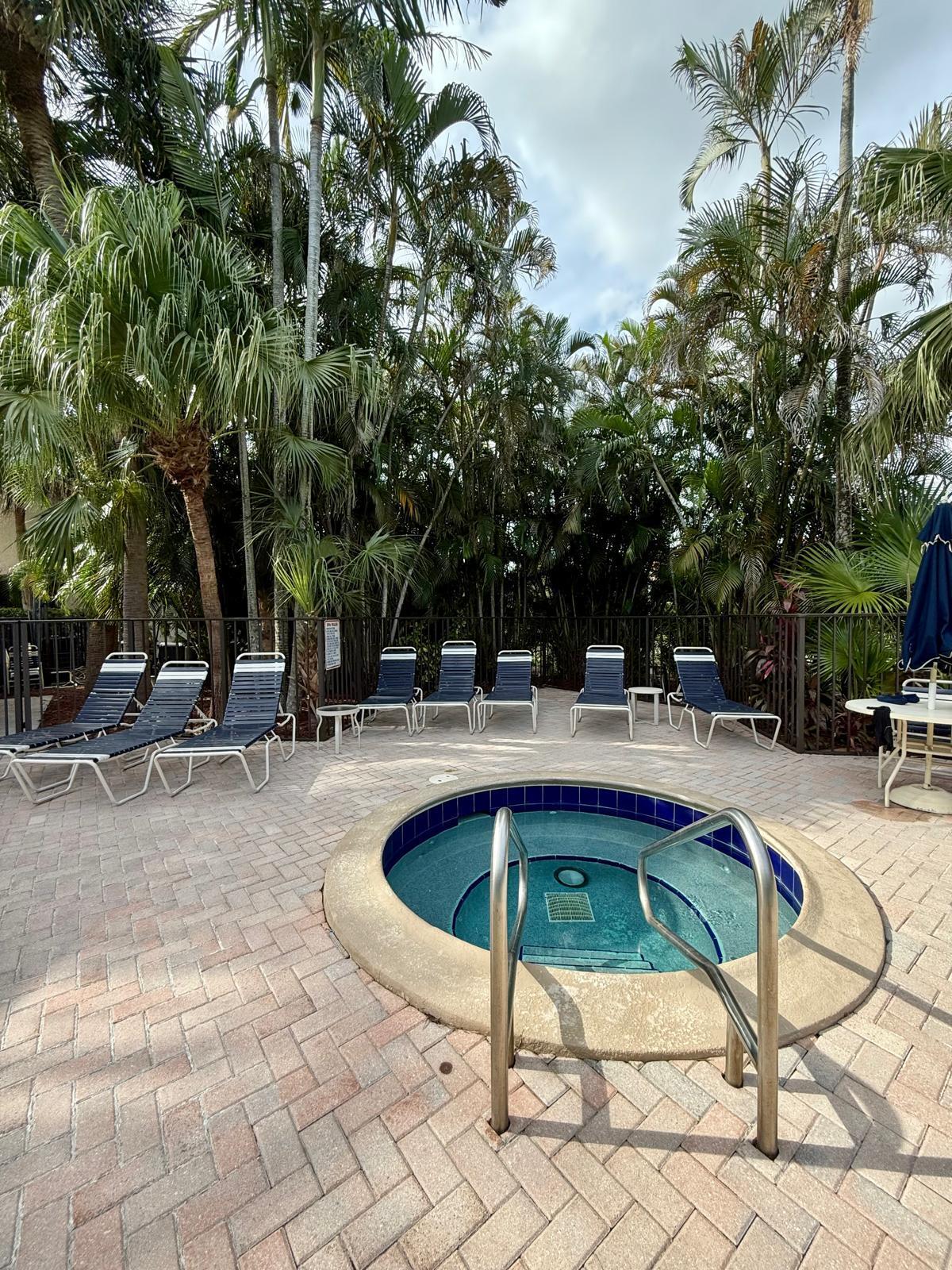 7888 La Mirada Drive Boca Raton, FL 33433 - Photo 27 of 29 a view of swimming pool with outdoor seating