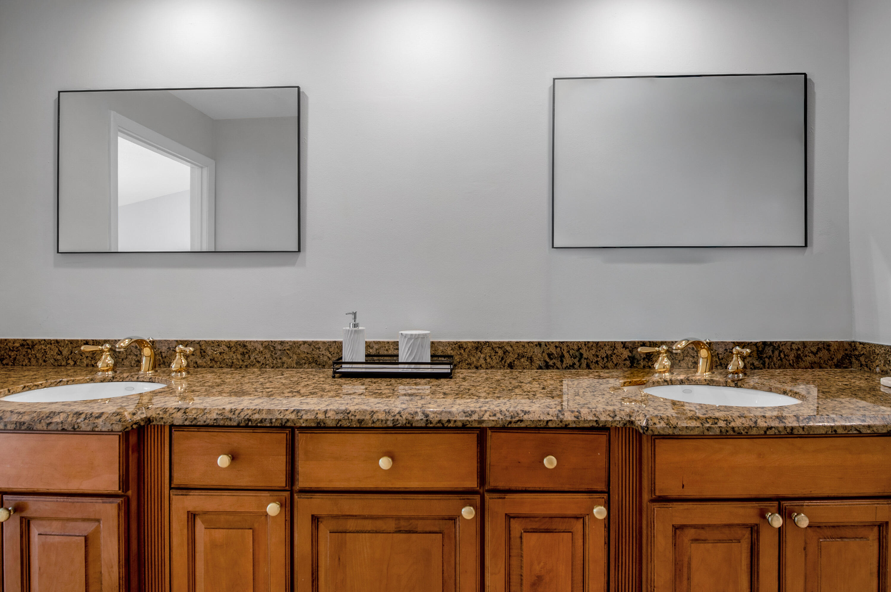7888 La Mirada Drive Boca Raton, FL 33433 - Photo 33 of 61 a bathroom with sink granite and mirror