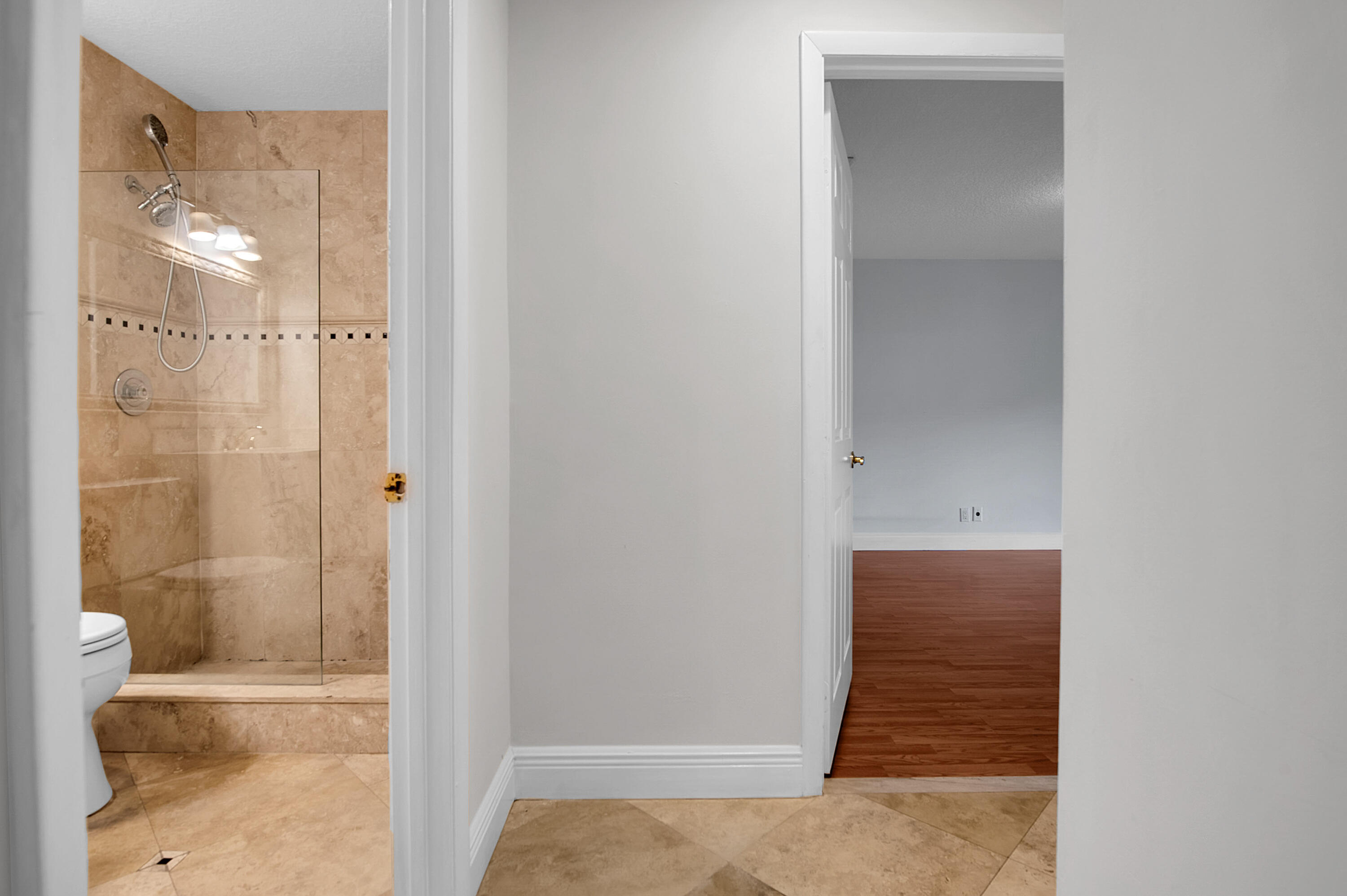 7888 La Mirada Drive Boca Raton, FL 33433 - Photo 35 of 61 a bathroom with a shower