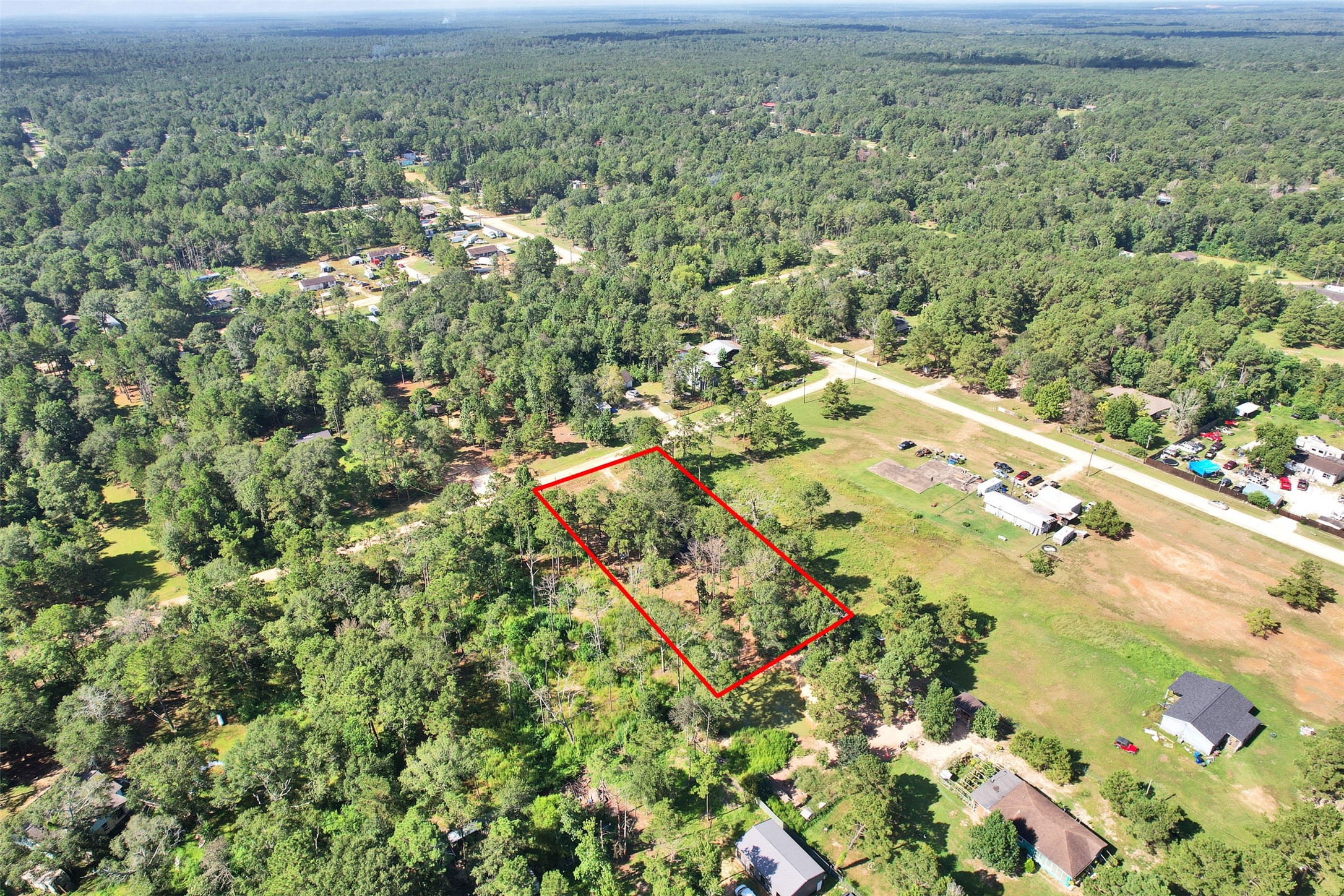 81 Hicks Cleveland, TX 77328 - Photo 24 of 24 an aerial view of residential houses with outdoor space