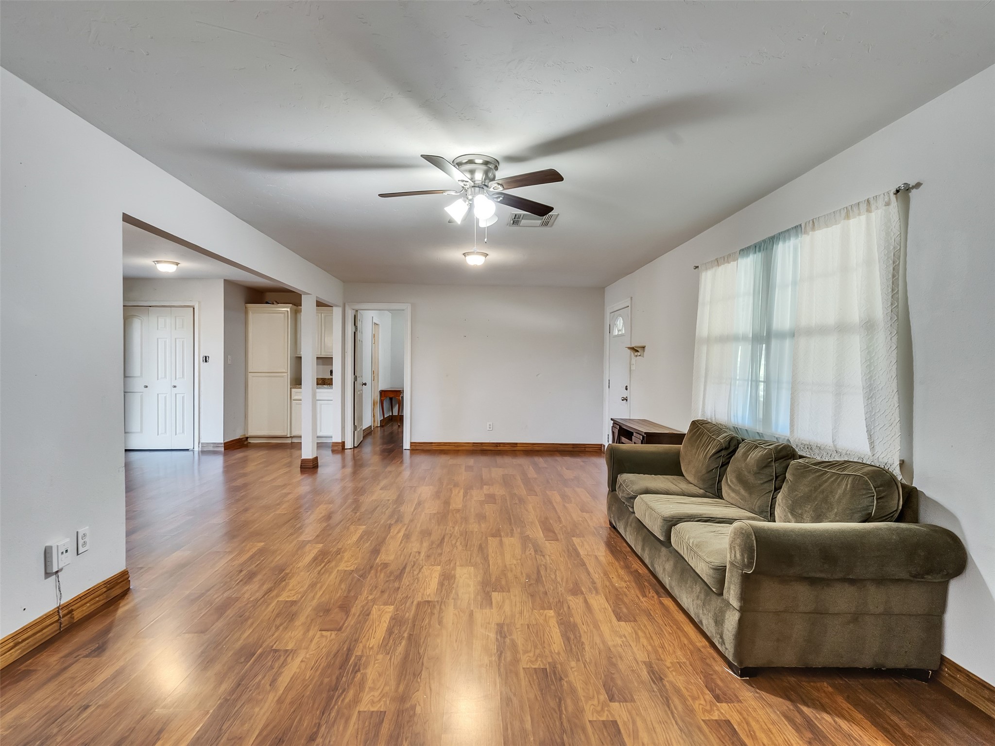 81 Hicks Cleveland, TX 77328 - Photo 5 of 24 a living room with furniture and a large window