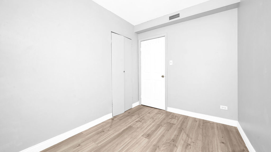 1831 West 21st Place, Unit 1R Chicago, IL 60608 - Photo 9 of 10 a view of small space with wooden floor